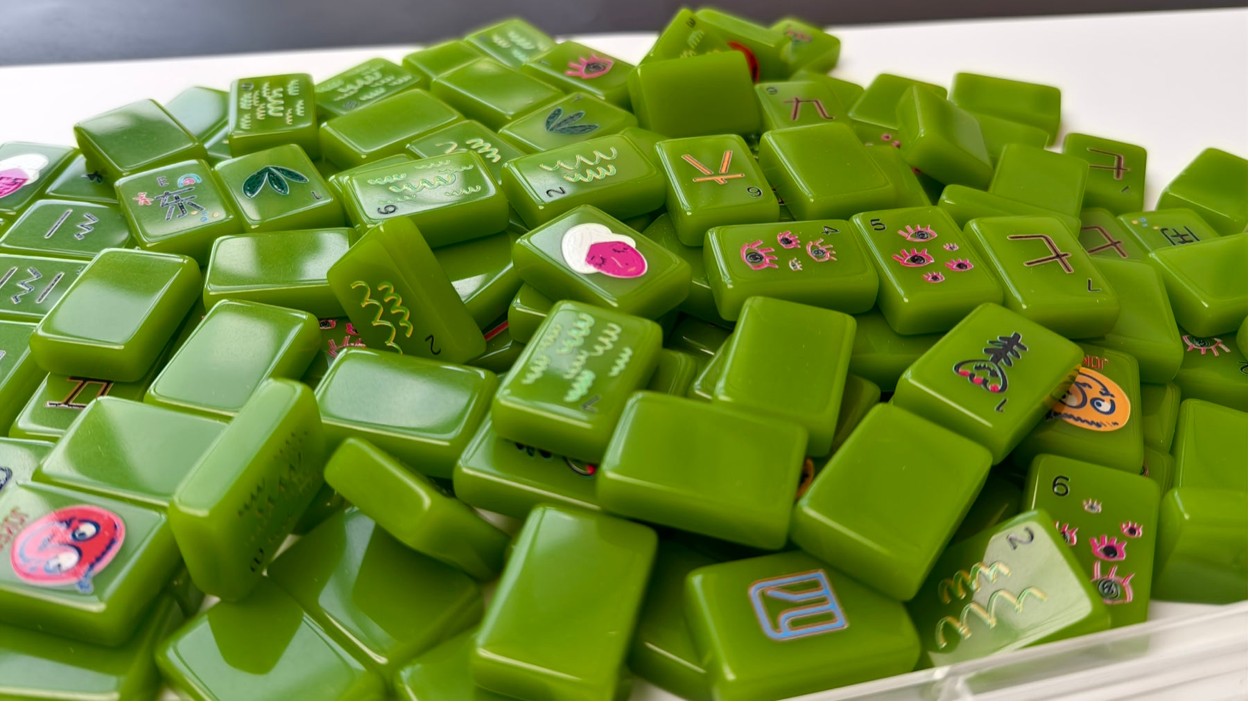 Visionary emerald American mahjong tiles — rack display and acrylic construction